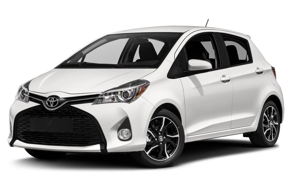 White Toyota Vitz hatchback
